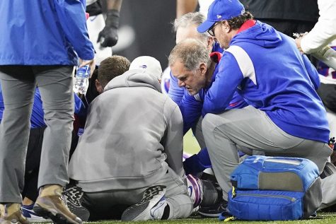 Buffalo Bills safety Damar Hamlin collapsed from a sudden cardiac arrest after making a tackle during Monday’s night football against the Cincinnati Bengals. The first responders administered CPR, with his heartbeat fortunately returning. They immediately rushed him to the Cincinnati Medical hospital, where fans gathered to show their support. This incident sheds light on the dangers surrounding football that nobody believes or wants to see, particularly the damage that stars take onto their bodies. This realization could ultimately revolutionize the lens in which American football fans view their favorite hobby.
