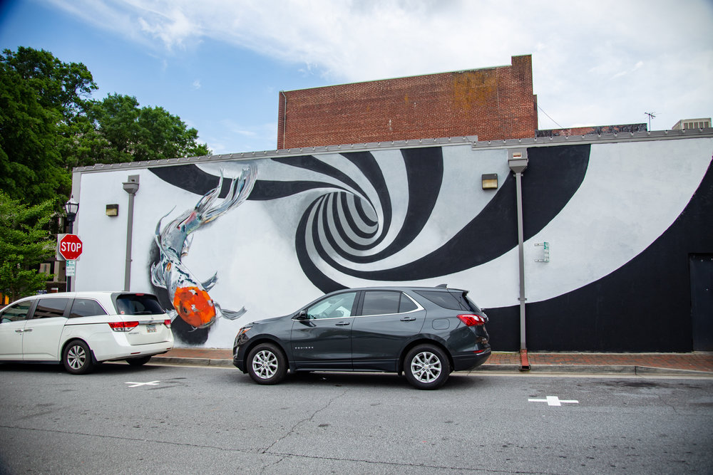 Mathew Mederer and Max Komarov created the “If You Don’t Stop, Then You Won’t Get Caught” mural. Mederer worked on street art for 19 years with his partner, Komarov. This became the first mural they designed in Georgia.  
