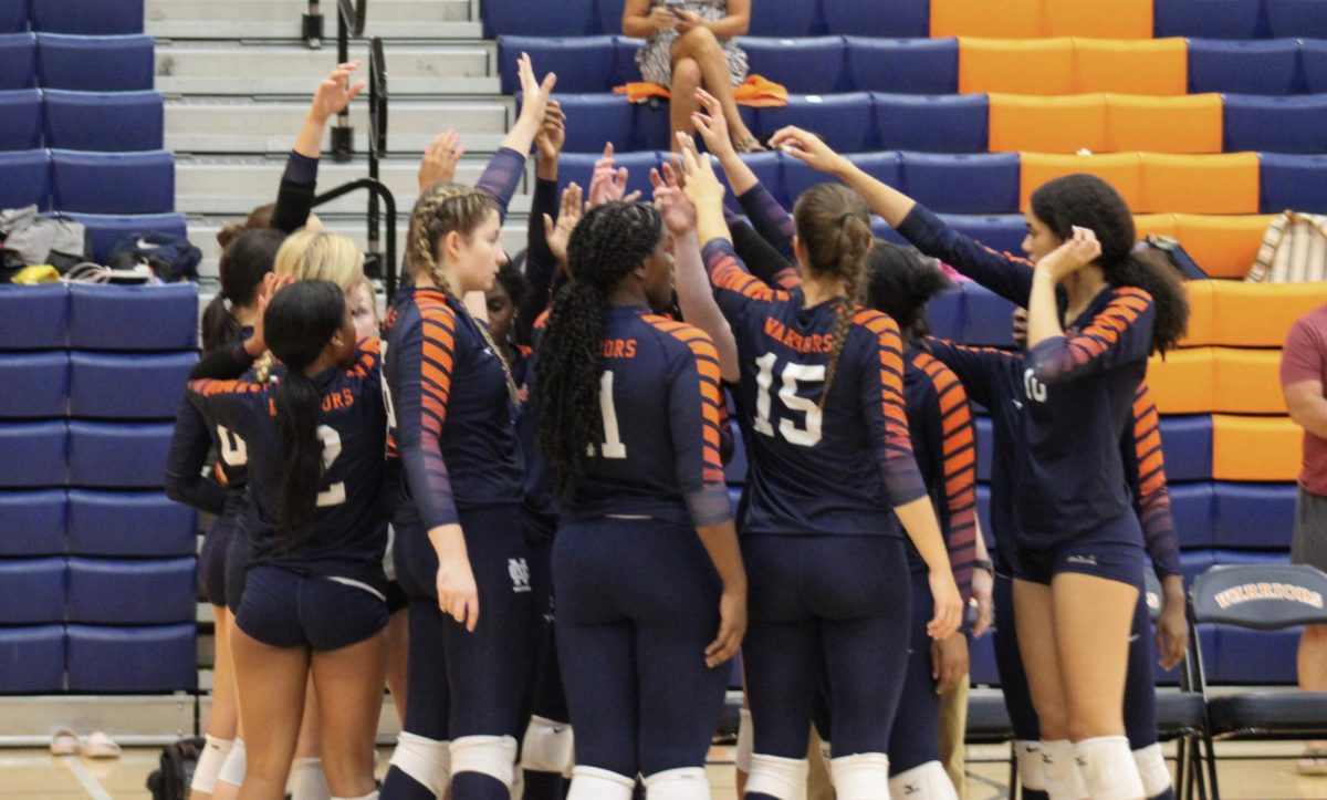 The+Lady+Warriors+varsity+volleyball+team+%2819-7%29+won+their+senior+night+region+match+against+the+Kennesaw+Mountain+Mustangs+%288-15%29+in+a+3-0+score.+The+senior+ceremony+produced+an+uproar+of+excitement+from+the+underclassmen+and+the+crowd+as+varsity+coach+Stephen+Sansing+recognized+and+celebrated+each+senior.+The+game+showcased+the+team%E2%80%99s+close+bond+and+passion+for+the+sport+as+they+cheered+for+each+other+throughout+the+match.%0A