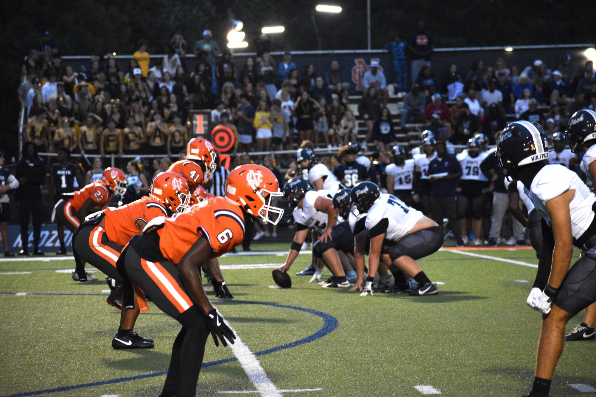 The NC Warriors scored a win against the North Paulding Wolves 42-18 Friday, September 13. The golden student section, beaming with pride for the support of NC’s Rally Club, created an exciting atmosphere that motivated the players. The Warriors added another point to their winning streak by beating the Wolves at the first regional game of the season.
