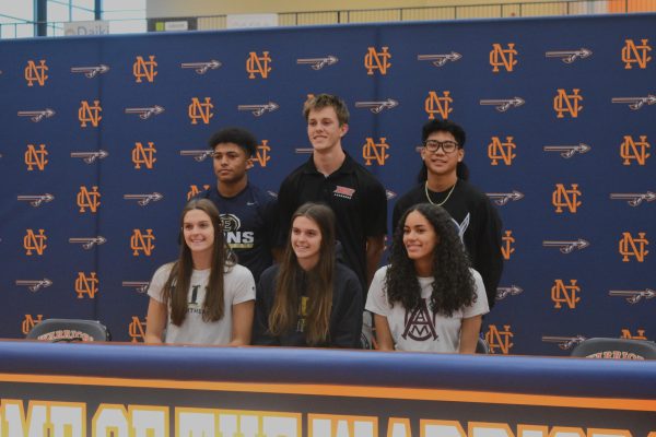 Every student-athlete awaits that coveted day when they declare, in front of their loved ones and coaches, where they plan to pursue sports after high school. For six of NC’s premiere players, November 13 marked that special day. Across varsity volleyball and lacrosse, love and appreciation for the successful seniors echoed through NC’s Arena and set the stage for future commitments. 