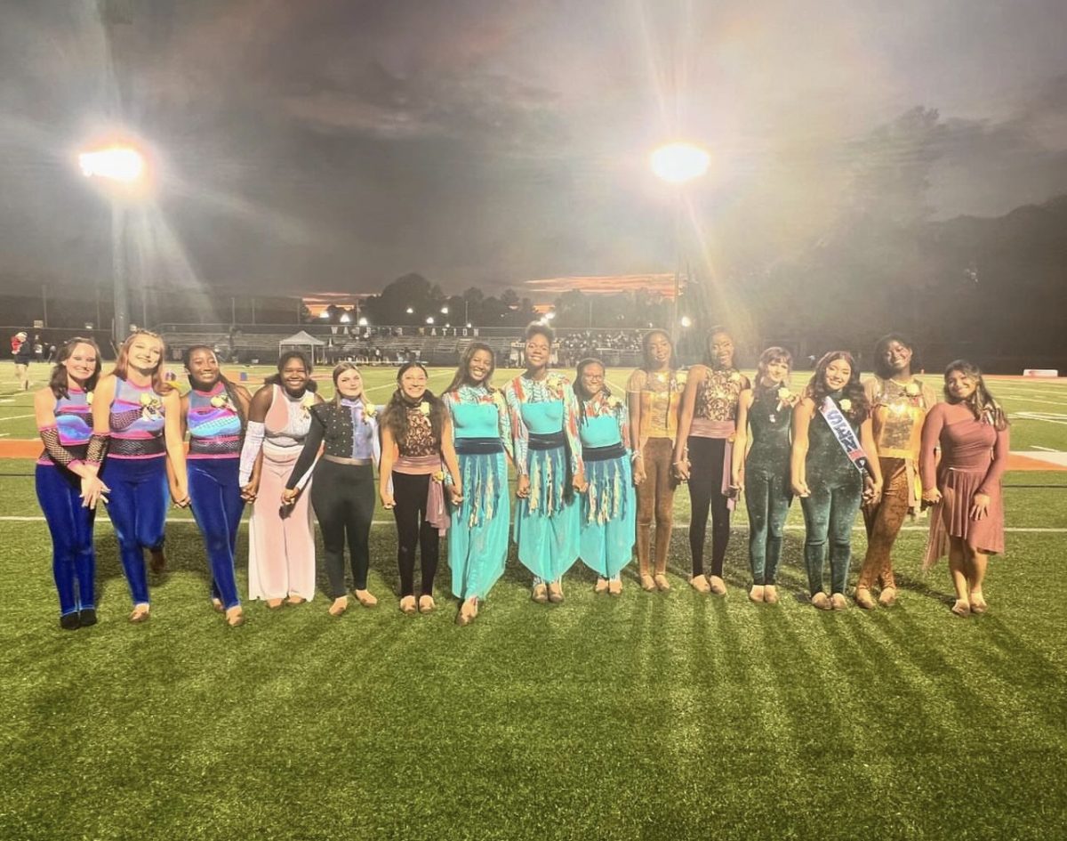 Reminiscing on their last season, NC color guard seniors laugh and cry together. From heartfelt speeches to spontaneuous dance circles, the night reflects their close-knit bond and journey as performers. Follow the team as they ride a wave of emotions, and celebrate their achievements. 